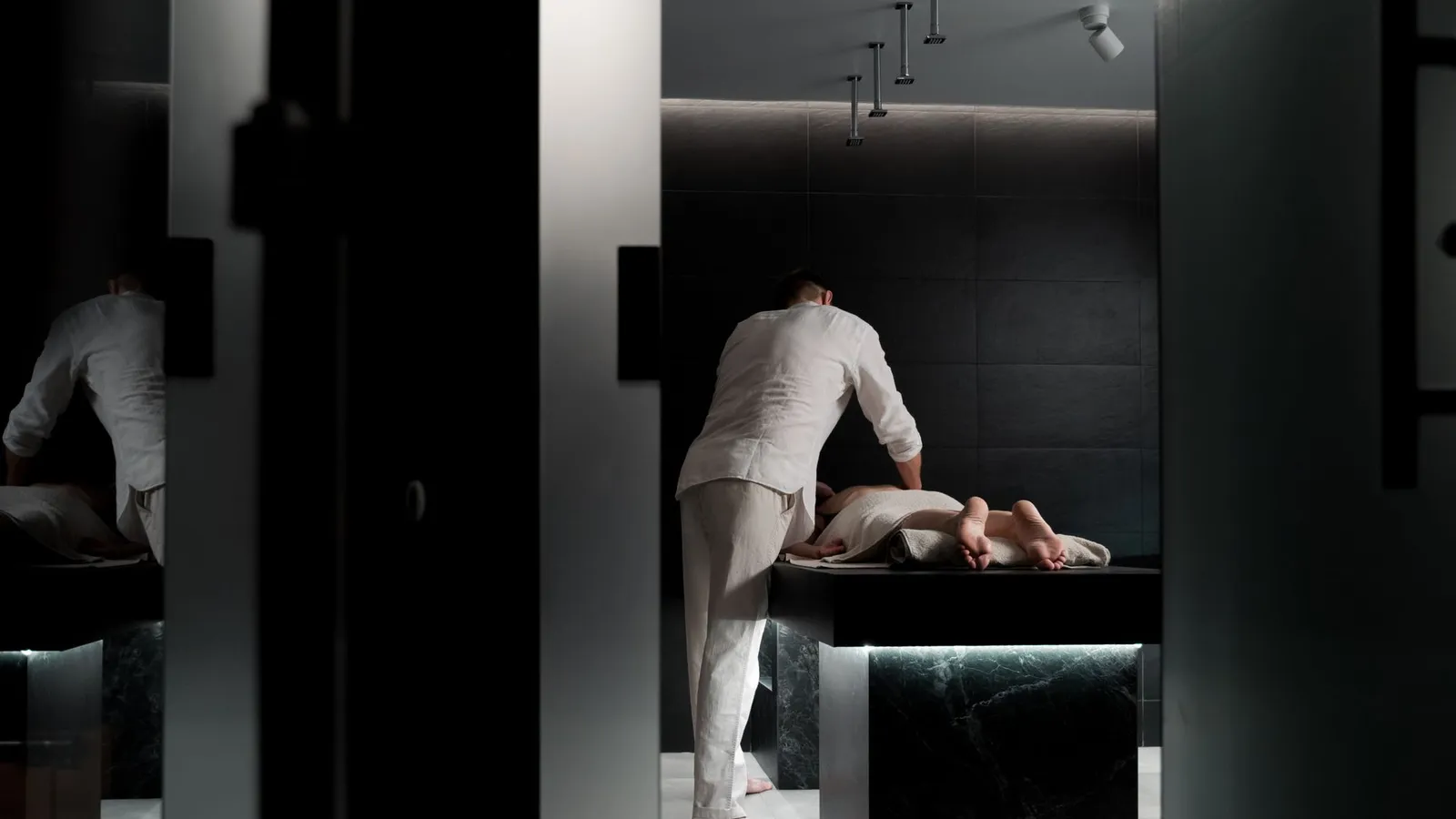 A relaxing massage in a modern spa room promoting wellness and self-care.