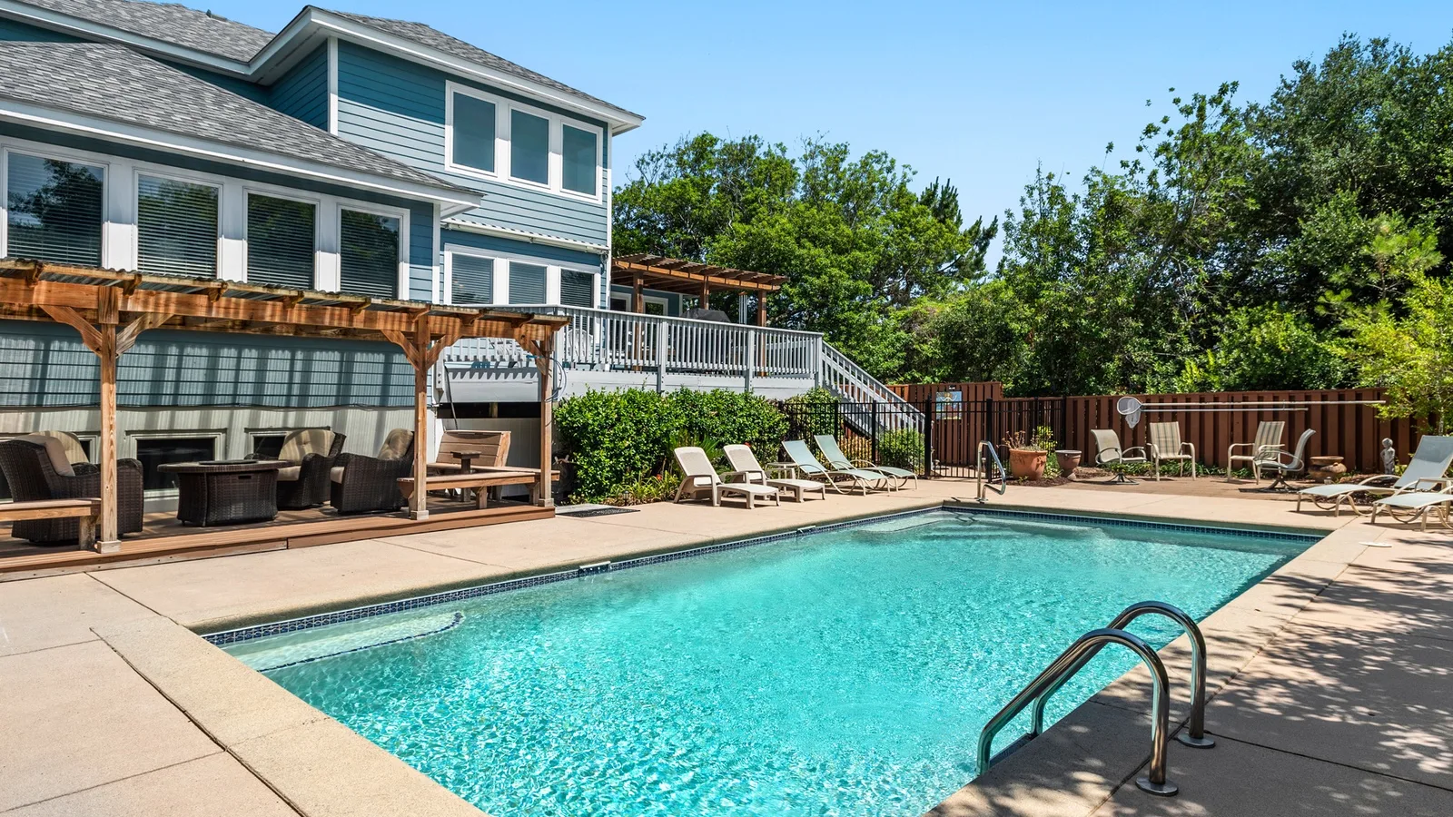 SH58: Blue Oasis - Village Realty — primary photo