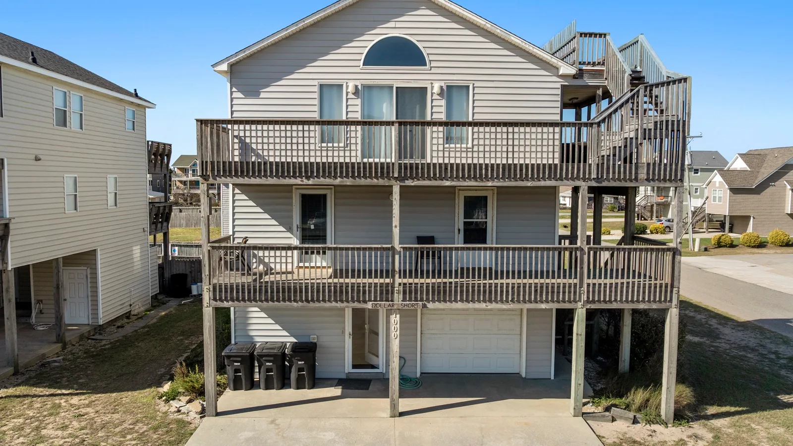 KDS2500: Dollar Short - Village Realty — primary photo