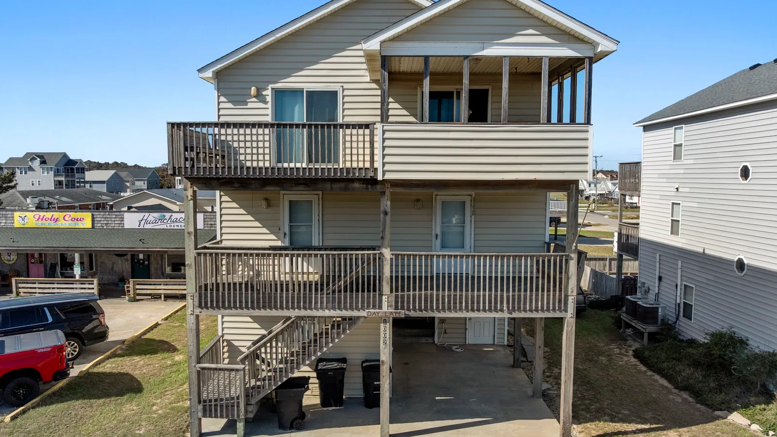 KDS2502: Day Late - Village Realty — primary photo
