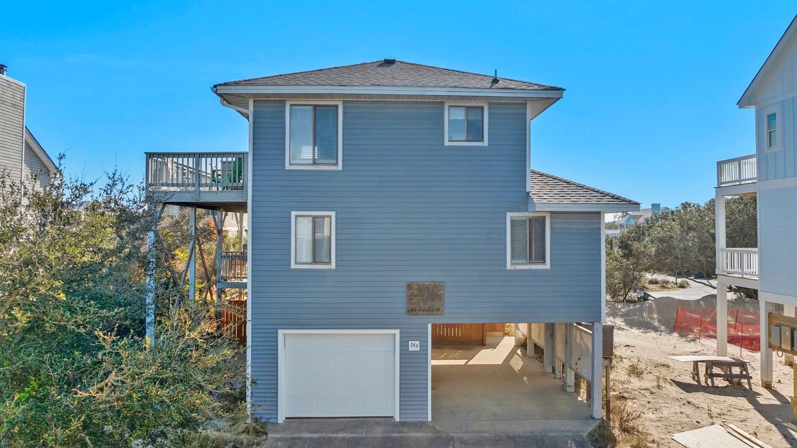 OSN06: Sunshine and Whiskey - Village Realty — primary photo